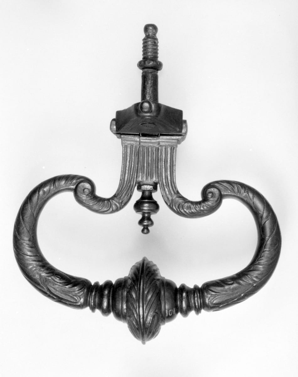 As black as a Newgate's knocker
