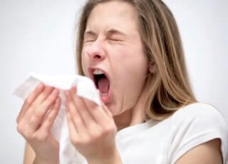 Why do we say 'bless you' when someone sneezes?