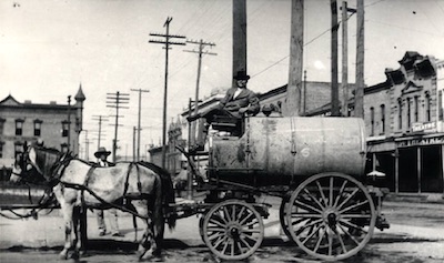 Image of horse with attached wagon